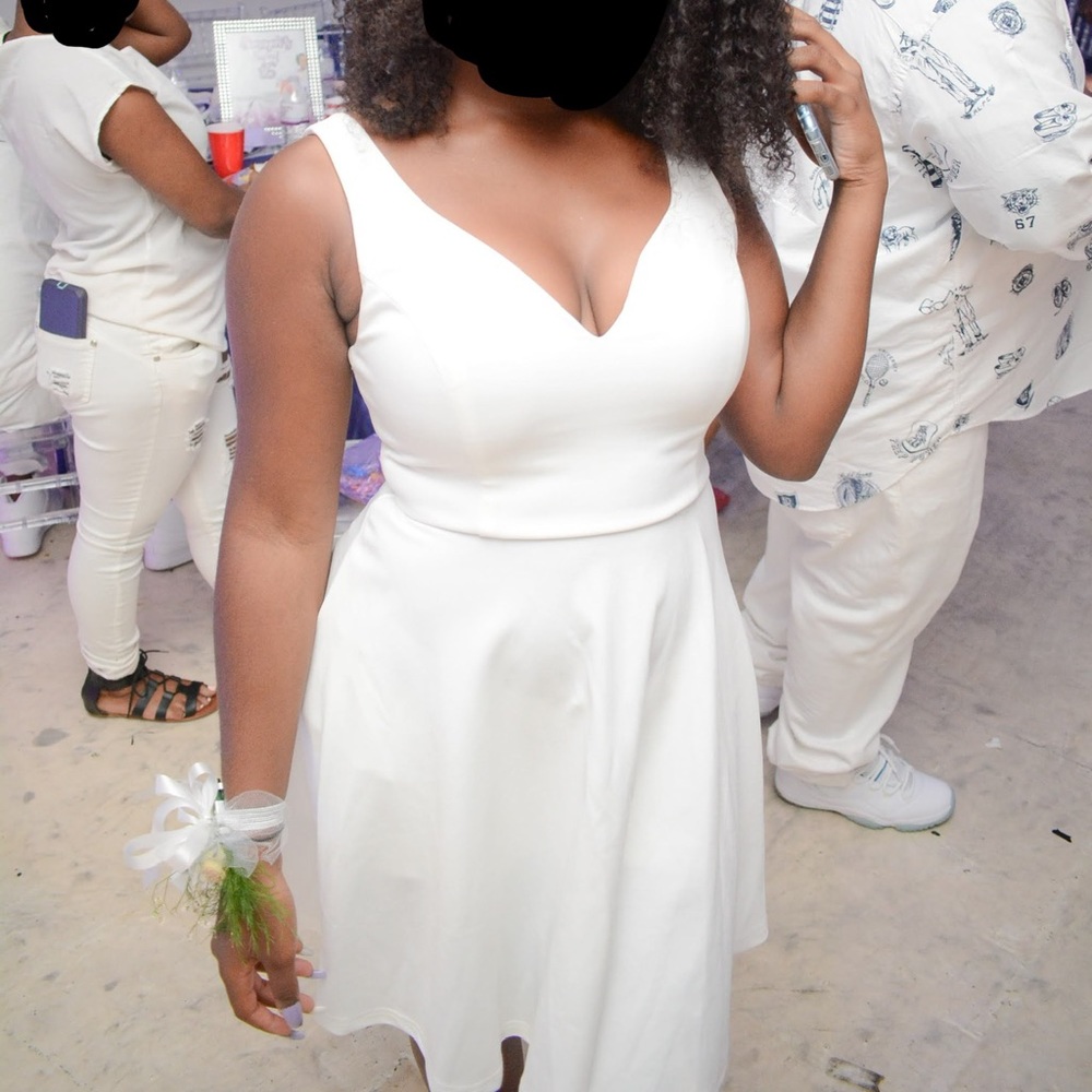 White Sleeveless V-Neck Dress